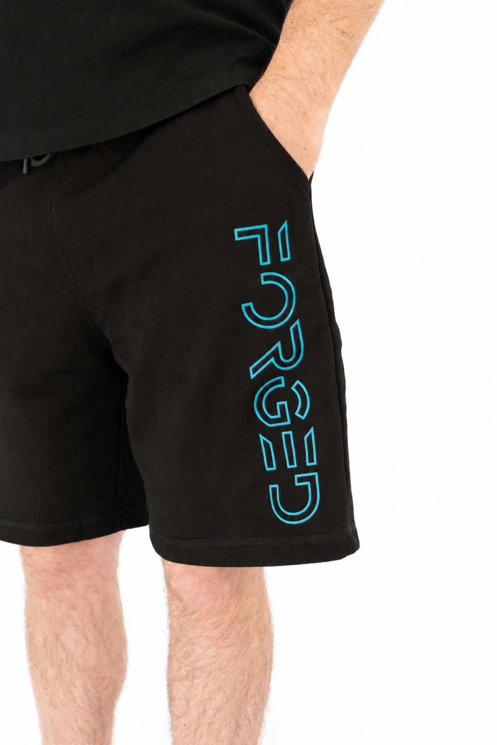 Black shorts with blue 'FORGED' text on a white background