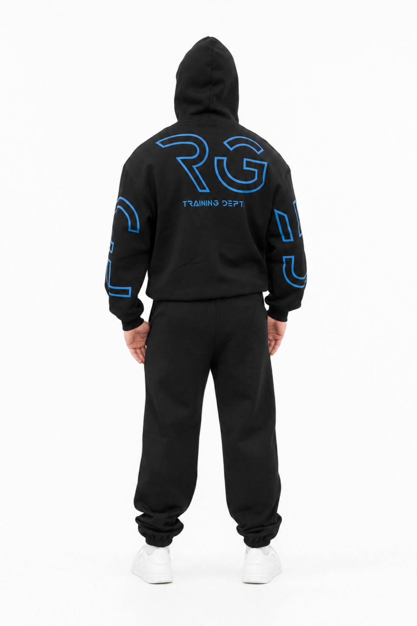 A person shown from the back wearing a black hooded sweatshirt and matching black jogger pants with bright blue outlined graphic lettering on the back and sleeves, photographed against a plain white studio background.